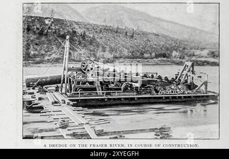 UNE DRAGUE SUR LE FLEUVE FRASER. EN COURS DE CONSTRUCTION. TIRÉ DE L'ARTICLE L'HISTOIRE ET LES PROGRÈS DE L'EXPLOITATION MINIÈRE EN COLOMBIE-BRITANNIQUE. Par H. Mortimer Lamb. Tiré de l'Engineering Magazine consacré au progrès industriel volume XIX 1900 The Engineering Magazine Co Banque D'Images