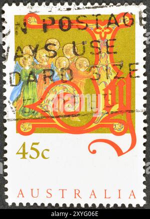 Timbre-poste annulé imprimé par l'Australie, qui montre joie, Noël, circa 1993. Banque D'Images