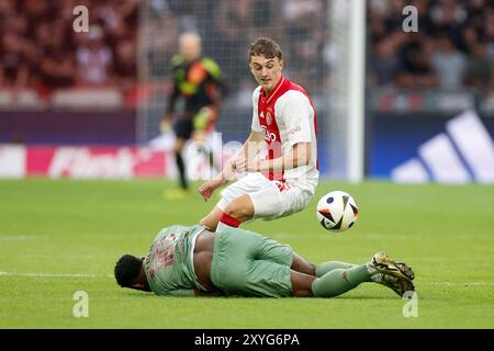 Amsterdam, pays-Bas. 29 août 2024. AMSTERDAM, 29-08-2024, JohanCruyff Arena, Europa League Play offs, saison 2024/2025, Ajax- Jagiellonia Bialystok. lr TJ10, joueur Ajax Youri Baas crédit : Pro Shots/Alamy Live News Banque D'Images