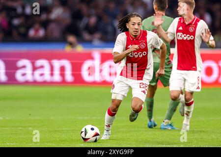 Amsterdam, pays-Bas. 29 août 2024. AMSTERDAM, PAYS-BAS - AOÛT 29 : Kian Fitz-Jim de l'AFC Ajax court avec le ballon lors du match de play-offs de l'UEFA Europa League entre l'AFC Ajax et Jagiellonia Bialystok au Johan Cruijff Arena le 29 août 2024 à Amsterdam, pays-Bas. (Photo de Peter Lous/Orange Pictures) crédit : Orange pics BV/Alamy Live News Banque D'Images