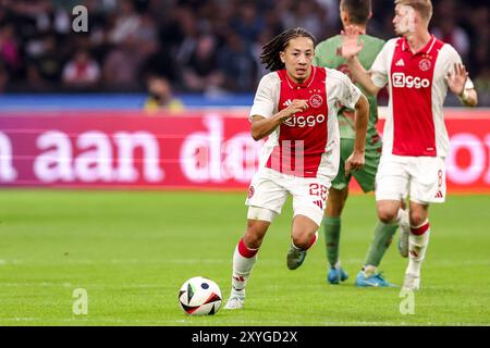 Amsterdam, pays-Bas. 29 août 2024. AMSTERDAM, PAYS-BAS - AOÛT 29 : Kian Fitz-Jim de l'AFC Ajax court avec le ballon lors du match de play-offs de l'UEFA Europa League entre l'AFC Ajax et Jagiellonia Bialystok au Johan Cruijff Arena le 29 août 2024 à Amsterdam, pays-Bas. (Photo de Peter Lous/Orange Pictures) crédit : dpa/Alamy Live News Banque D'Images