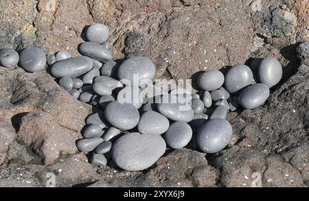 Pierres de lave sur la plage de Malarrif sur la péninsule de Snaefellsnes en Islande Banque D'Images