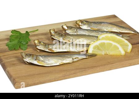 Anchois sur une planche en bois Banque D'Images