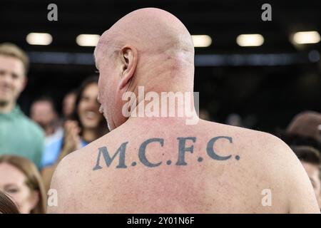 Londres, Royaume-Uni. 31 août 2024. Un fan de Manchester City avec le « MCFC » tatoué sur le dos lors du match de premier League West Ham United vs Manchester City au London Stadium, Londres, Royaume-Uni, le 31 août 2024 (photo par Mark Cosgrove/News images) à Londres, Royaume-Uni le 31/08/2024. (Photo de Mark Cosgrove/News images/SIPA USA) crédit : SIPA USA/Alamy Live News Banque D'Images
