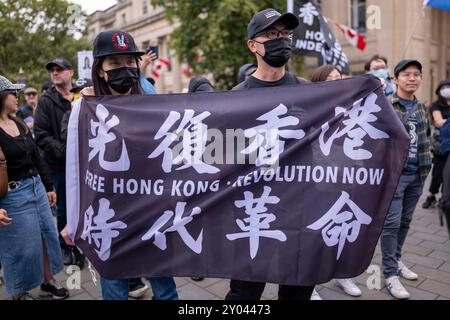 Les manifestants pour la libération de Hong Kong se sont rassemblés à Trafalgar Square pour se souvenir de ceux qui ont été traduits en justice lors de l'incident de 831, qui a conduit à des passages à tabac et à des arrestations massives de personnes le 31 août 2019. Banque D'Images