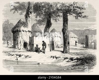 Village d'une ancienne tribu africaine avec des huttes construites de paille et de boue, Soudan. Afrique, dessin de Karl Girardet (1813-1871) voyage vers la rivière Gazelles, Nil Blanc, 1856-1857 par Angelo Bolognese. Le Tour du monde 1862 Banque D'Images