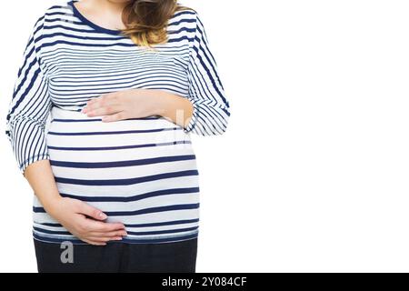 Jeune femme enceinte en bleu et blanc dans un style marin. Close up Banque D'Images