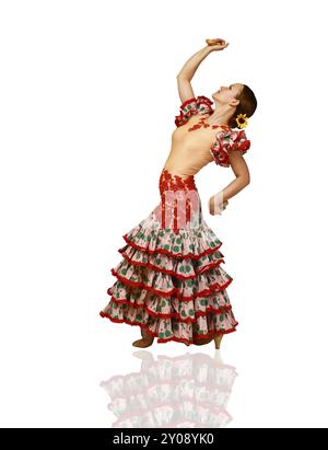 Jeune femme danser le flamenco sur fond blanc Banque D'Images