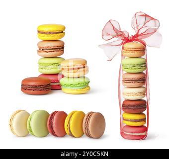 Délicieux macarons colorés sur fond blanc Banque D'Images