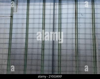 Matte Finish: Glass Frame Background with Grid Canvas Pattern and Texture. Out of focus, concept. Stock Photo