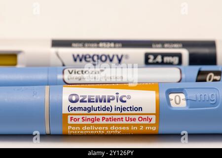 Nature morte gros plan des trois grands médicaments injectables de perte de poids de prescription. Ozempic, Victoza et Wegovy. Banque D'Images