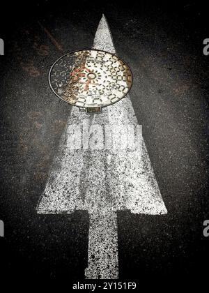 Arrow sign on road Banque D'Images