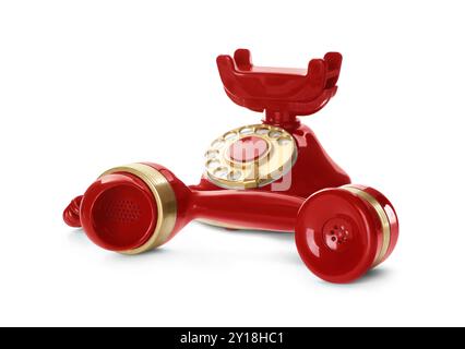 Élégant téléphone rouge vintage isolé sur blanc Banque D'Images