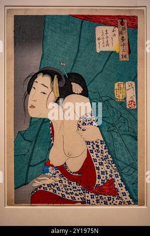 Imprimé japonais sur bois avec gaufrage de Tsukioka Yoshitoshi (1839-1892), semblant démangeant : l'apparence d'une femme gardée de l'ère Kaei, de la se Banque D'Images