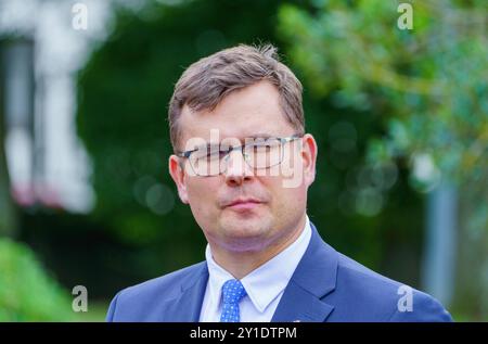 Ramstein Miesenbach, Allemagne. 06 septembre 2024. Laurynas Kasciunas, ministre lituanien de la Défense, fait une déclaration à la presse lors de la réunion du Groupe de contact Ukraine à la base aérienne de Ramstein. Les partenaires occidentaux de l’Ukraine se réunissent pour la dernière fois avant l’élection présidentielle américaine pour des consultations personnelles en format Ramstein. Ils discutent de l'aide en matière d'armement pour l'Ukraine et d'une perspective pour le pays attaqué par la Russie. Crédit : Andreas Arnold/dpa/Alamy Live News Banque D'Images