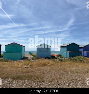 Beach cabanes en bord de mer dans le Sussex, Angleterre Banque D'Images