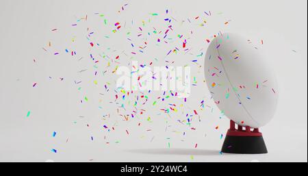 Image de confettis sur ballon de rugby blanc sur fond blanc Banque D'Images