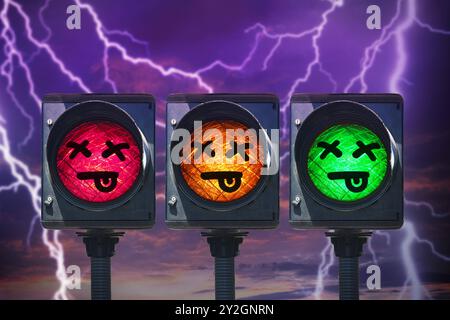 FOTOMONTAGE, Ampel mit totem Emoji-Symbol, Symbolfoto Ampel-Streit und Ampel-Aus *** FOTOMONTAGE, feu de circulation avec symbole emoji mort, symbole photo feu de circulation dispute et feu de circulation éteint Banque D'Images