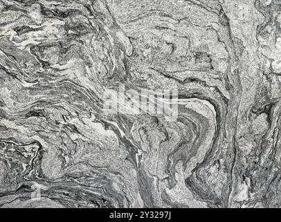 Gros plan de la dalle de granit naturel Viccount White. Gris, argent, scintillant et blanc. Granit argenté et texture de marbre. Texture de motif sans couture Banque D'Images