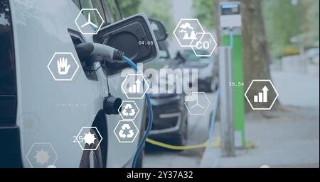 Image des icônes écologiques et des données sur la charge de voiture électrique au port Banque D'Images