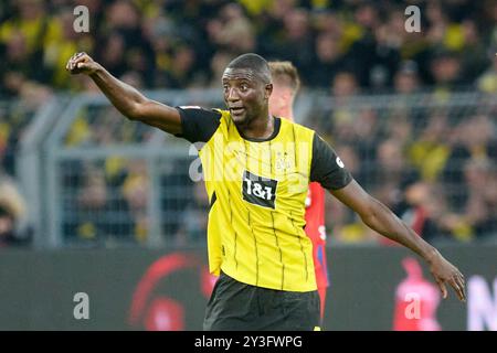 Dortmund, Allemagne. 13 septembre 2024. Football, Bundesliga, Borussia Dortmund - 1 FC Heidenheim, Journée 3, signal Iduna Park, Dortmund's Serhou Guirassy en action. Crédit : Bernd Thissen/dpa - NOTE IMPORTANTE : conformément aux règlements de la DFL German Football League et de la DFB German Football Association, il est interdit d'utiliser ou de faire utiliser des photographies prises dans le stade et/ou du match sous forme d'images séquentielles et/ou de séries de photos de type vidéo./dpa/Alamy Live News Banque D'Images
