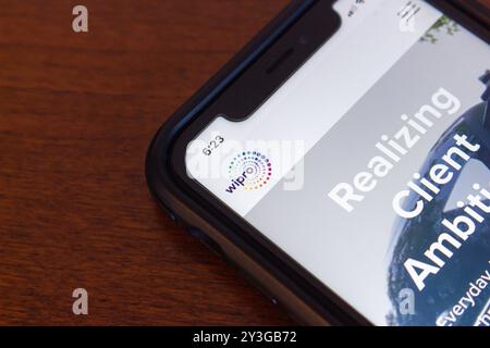 Le site Web Wipro s'affiche sur un écran iPhone. Wipro est une multinationale basée en Inde qui fournit principalement des services INFORMATIQUES, des BPO et des conseils Banque D'Images