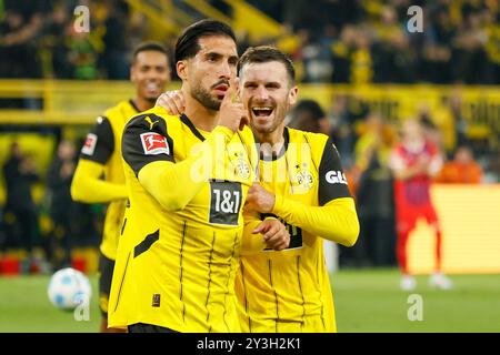 Dortmund, Allemagne. 13 septembre 2024. Emre Can (avant l) du Borussia Dortmund célèbre le but lors du match de football de première division allemande en Bundesliga entre le Borussia Dortmund et le 1er. FC Heidenheim 1846 à Dortmund, Allemagne, 13 septembre 2024. Crédit : Yue Aximu¤biwalezi/Xinhua/Alamy Live News Banque D'Images