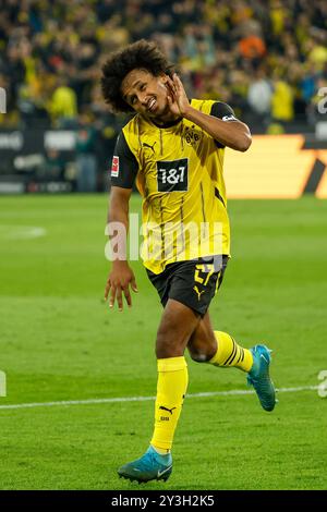 Dortmund, Allemagne. 13 septembre 2024. Karim Adeyemi du Borussia Dortmund célèbre le but lors du match de football de première division allemande en Bundesliga entre le Borussia Dortmund et le 1er. FC Heidenheim 1846 à Dortmund, Allemagne, 13 septembre 2024. Crédit : Yue Aximu¤biwalezi/Xinhua/Alamy Live News Banque D'Images