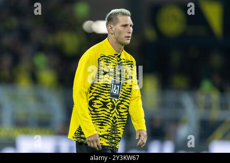 Allemagne. 13 septembre 2024. Fussball 1. Liga Borussia Dortmund - 1. FC Heidenheim AM 13.09.2024 im signal Iduna Park in Dortmund Niklas Suele ( Dortmund ) la réglementation DFB interdit toute utilisation de photographies comme séquences d'images et/ou quasi-vidéo. Foto : Revierfoto crédit : ddp Media GmbH/Alamy Live News Banque D'Images