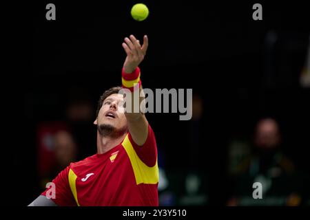 Pablo Carreno Busta, d’Espagne, en action contre l’équipe Jordan Thompson, d’Australie, lors du match en simple du Groupe B final de la Coupe Davis, le 15 septembre, Banque D'Images