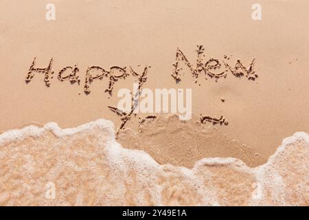 inscription bonne année au bord de la mer Banque D'Images