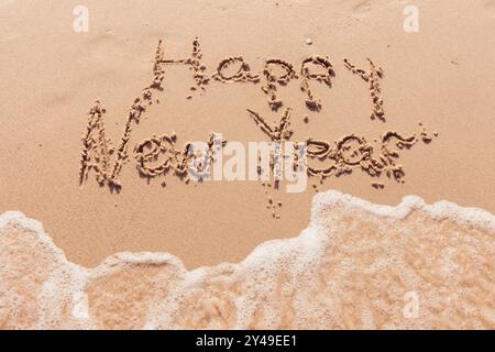 inscription bonne année au bord de la mer Banque D'Images