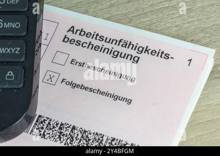 Gros plan d'un certificat d'incapacité de travail, Allemagne Banque D'Images