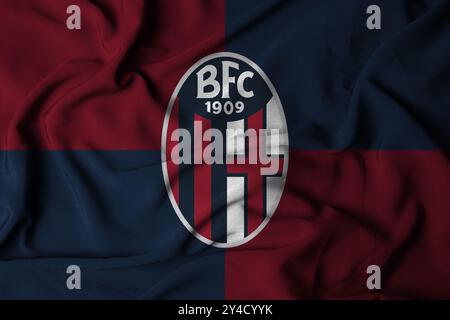 Pringsewu, Lampung 18 septembre 2024 ; texture du logo du drapeau à foyer sélectif de l'arrière-plan du BOLOGNA FC. Drapeau du club de football européen. Illustration 3D. Banque D'Images