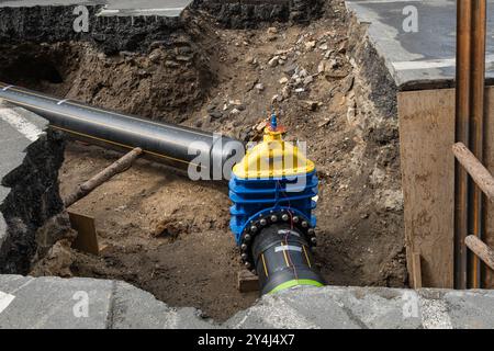 tubes souterrains, remplacement des systèmes d'eau et de gaz. Projet de développement urbain. Entretien des infrastructures de rue de la ville Banque D'Images