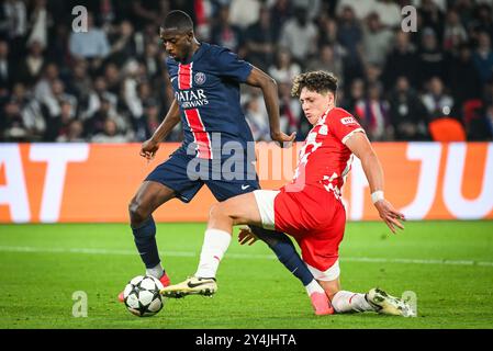 Paris, France, France. 18 septembre 2024. Ousmane DEMBELE du PSG et Ladislav KREJCI de Gérone lors du match MD1 de l'UEFA Champions League, League phase MD1 entre le Paris Saint-Germain et le Girona FC au Parc des Princes Stadium le 18 septembre 2024 à Paris, France. (Crédit image : © Matthieu Mirville/ZUMA Press Wire) USAGE ÉDITORIAL SEULEMENT! Non destiné à UN USAGE commercial ! Banque D'Images