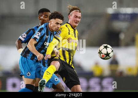 Bruges, Belgique. 18 septembre 2024. Chemsdine Talbi du club et Julian Brandt du Borussia se battent pour le ballon lors d'un match de football entre le Club belge Brugge KV et l'Allemand Borussia Dortmund, mercredi 18 septembre 2024 à Bruges, le premier jour de la phase de l'UEFA Champions League. BELGA PHOTO BRUNO FAHY crédit : Belga News Agency/Alamy Live News Banque D'Images