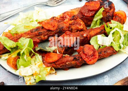 Côtes de porc braisées à la sauce tomate. BARBECUE. Ragoût. Banque D'Images