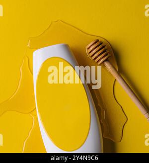 bouteille de shampooing vierge et bâton de miel Banque D'Images