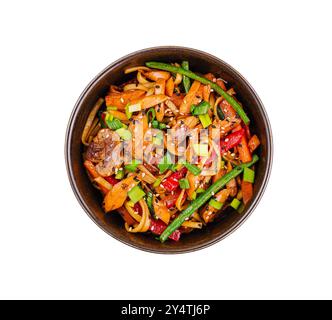 Sauté savoureux avec du bœuf, des légumes mélangés et de la sauce orientale dans un bol, parfait pour les thèmes culinaires Banque D'Images