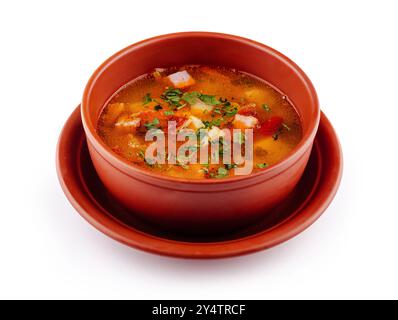 Soupe chaude aromatique et vapeur avec viande et légumes est servie dans un bol marron, parfait pour un repas réconfortant et savoureux Banque D'Images