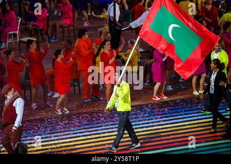 Celtic Park, Glasgow, Écosse, Royaume-Uni, mercredi, 23 juillet 2014. Le porte-drapeau de l'équipe Maldives Hassan Saaid lors de la cérémonie d'ouverture des Jeux du Commonwealth de Glasgow 2014 Banque D'Images