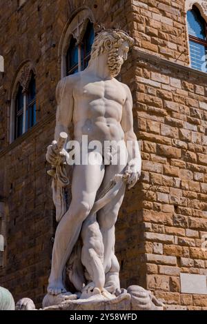 Piazza della Signoria, les statues de Donatello et Michel-Ange, les palais et la fontaine de Neptune par Bartolomeo Ammannati. Florence, Toscane I. Banque D'Images