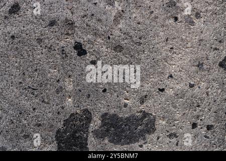 Fond de bloc de pierre de tuf noir naturel dans la ville de Gyumri, Arménie Banque D'Images