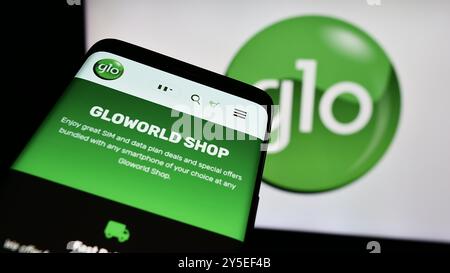 Allemagne. 19 août 2024. Dans cette illustration photo, un téléphone portable avec le site Web de la société de télécommunications nigériane Globacom Limited (GLO) est vu devant le logo. (Crédit image : © timon Schneider/SOPA images via ZUMA Press Wire) USAGE ÉDITORIAL SEULEMENT ! Non destiné à UN USAGE commercial ! Banque D'Images