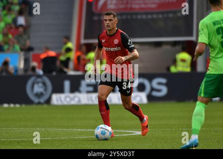 Leverkusen, Deutschland. 22 septembre 2024. Fussball ; Spieltag 04 ; 1. Bundesliga ; saison 2024/2025, Bayer Leverkusen gegen VfL Wolfsburg AM 22.09.2024 à Leverkusen. UBz : 34 granit Xhaka, Bayer Leverkusen. Crédit : dpa/Alamy Live News Banque D'Images