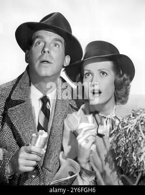 Fred MacMurray et Maureen O'Hara. Publicité toujours des acteurs, Fred MacMurray et O'Hara dans Father Was a Fullback (1949) Banque D'Images