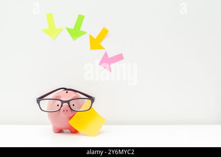 Tirelire avec des flèches Banque D'Images