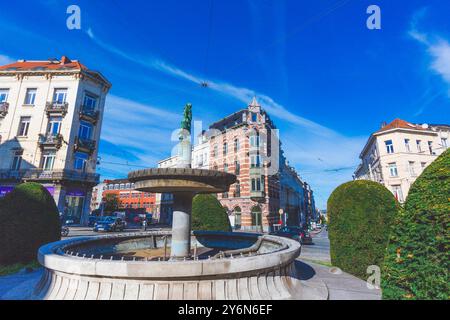 Belgique, Bruxelles, Saint-Gilles,porte-eau est une statue en bronze de Julien Dillens érigée au centre de la barrière de Saint-Gilles Banque D'Images
