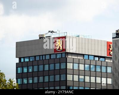 Finnlandhaus (Finland House) extérieur du bâtiment avec les armoiries sur la façade. Le lion doré sur fond rouge est un symbole des Finlandais. Banque D'Images